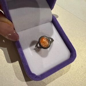 Sunstone on 925 silver setting

Adjustable